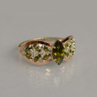 Срібна каблучка з золотими вставками