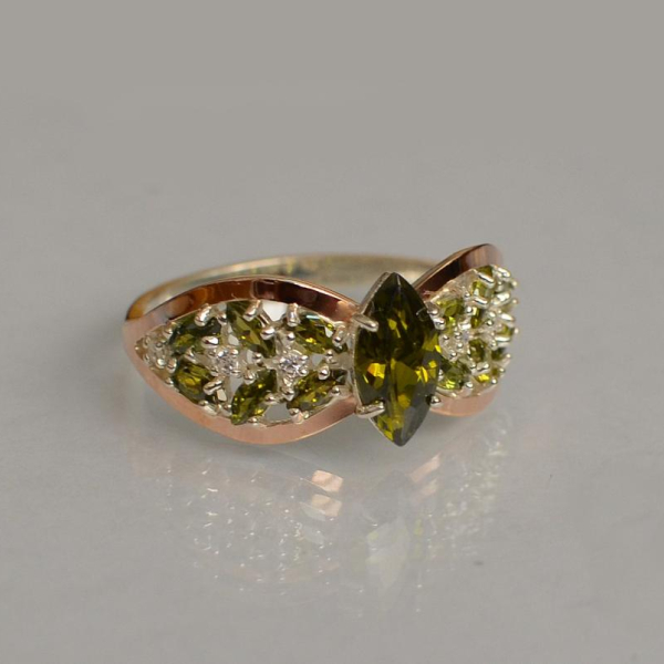 Срібна каблучка з золотими вставками