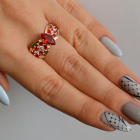 Срібна каблучка з золотими вставками