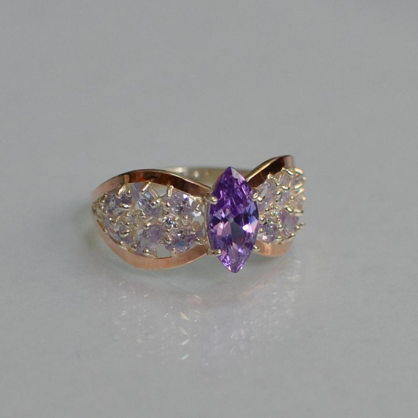 Срібна каблучка з золотими вставками