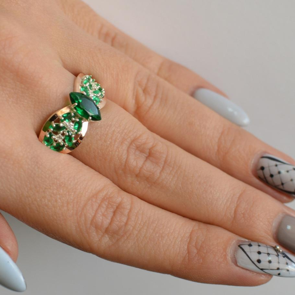 Срібна каблучка з золотими вставками