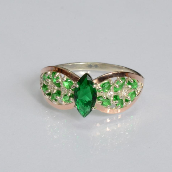 Срібна каблучка з золотими вставками