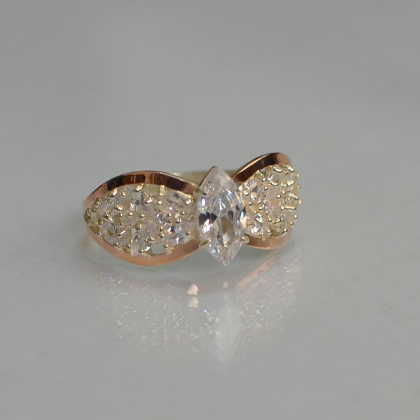 Срібна каблучка з золотими вставками