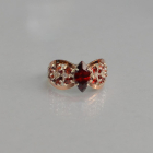 Срібна каблучка з золотими вставками