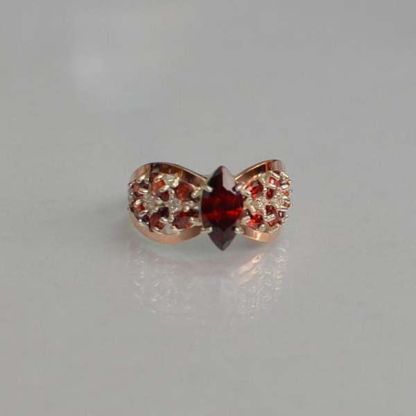 Срібна каблучка з золотими вставками