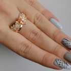 Срібна каблучка з золотими вставками