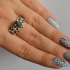 Срібна каблучка з золотими вставками