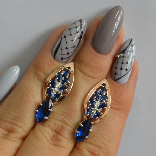 Срібні сережки з золотими вставками