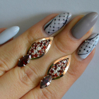 Срібні сережки з золотими вставками