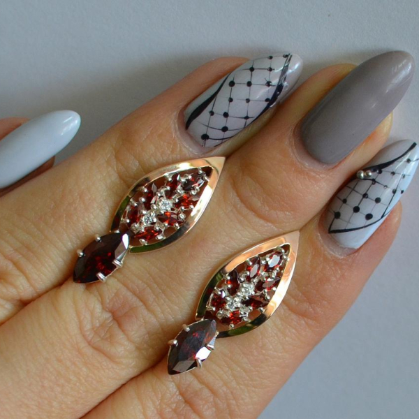 Срібні сережки з золотими вставками