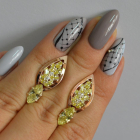 Срібні сережки з золотими вставками