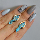 Срібні сережки з золотими вставками