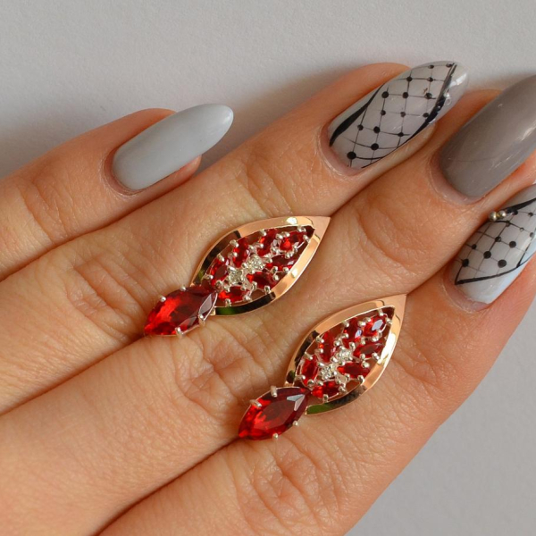 Срібні сережки з золотими вставками