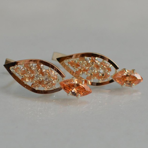 Срібні сережки з золотими вставками