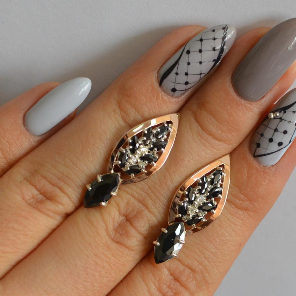 Срібні сережки з золотими вставками