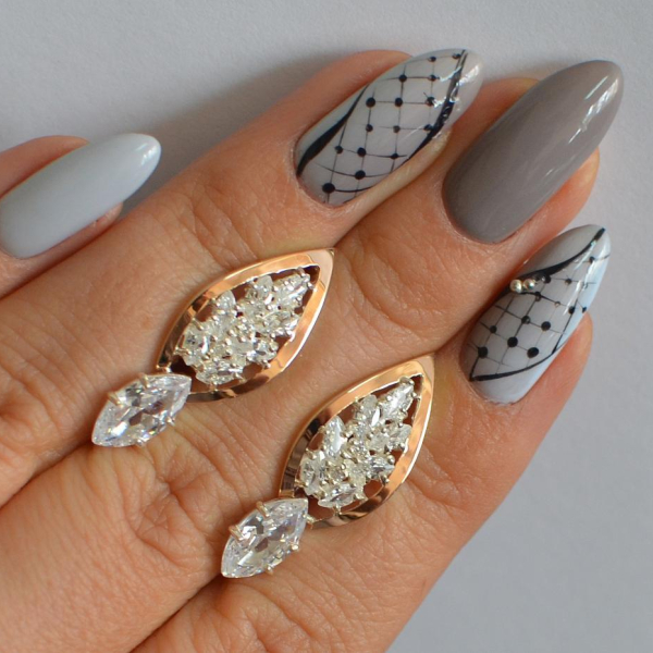 Срібні сережки з золотими вставками