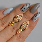 Срібні сережки з золотими вставками