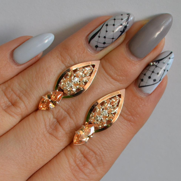 Срібні сережки з золотими вставками