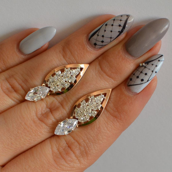 Срібні сережки з золотими вставками