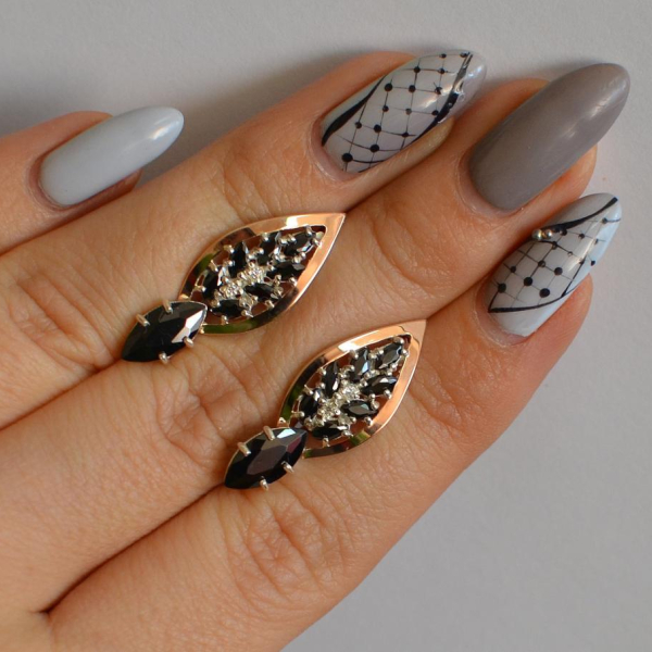 Срібні сережки з золотими вставками