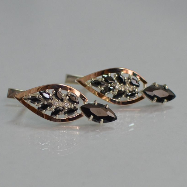 Срібні сережки з золотими вставками