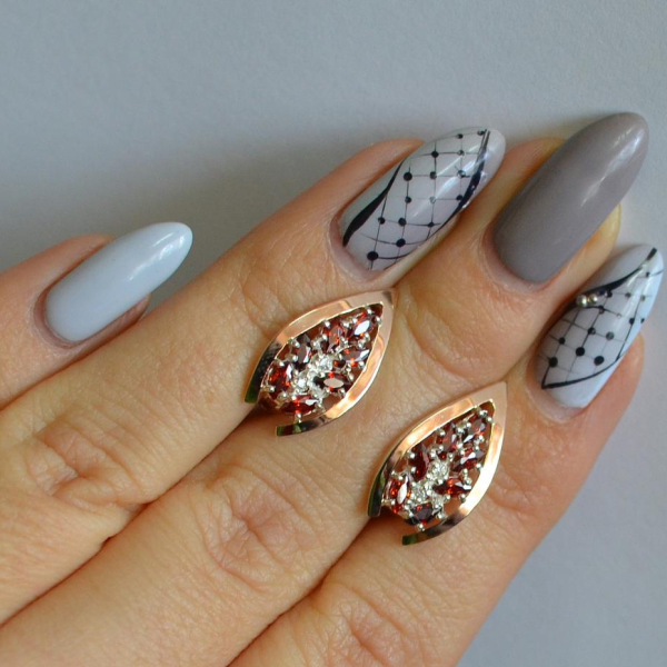 Срібні сережки з золотими вставками