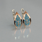 Срібні сережки з золотими вставками