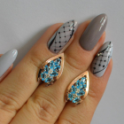 Срібні сережки з золотими вставками