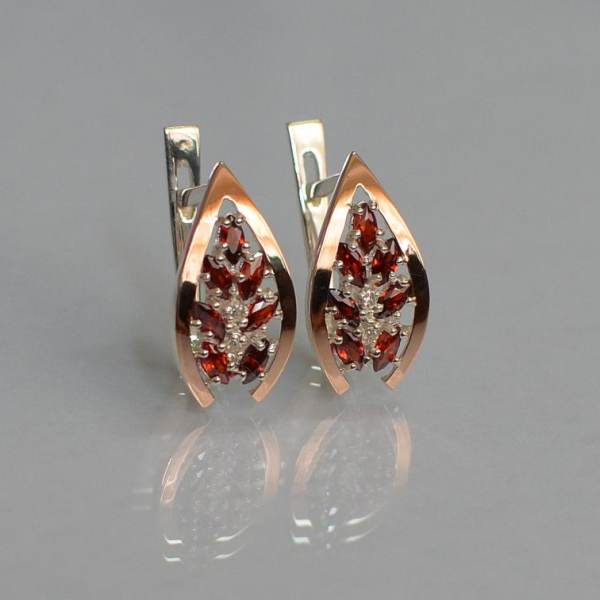 Срібні сережки з золотими вставками