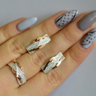 Срібний набір з золотими пластинами