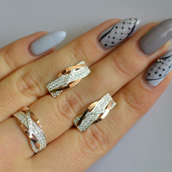 Срібний набір з золотими пластинами