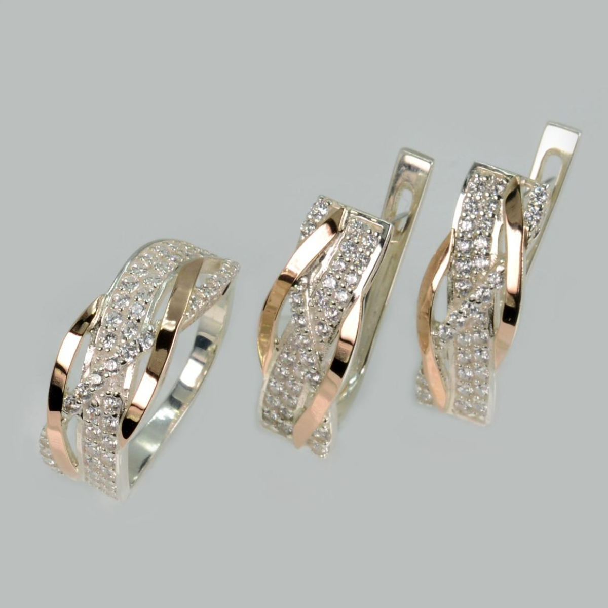 Срібний набір з золотими пластинами