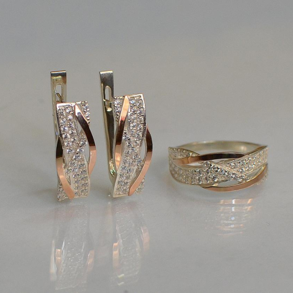 Срібний набір з золотими пластинами