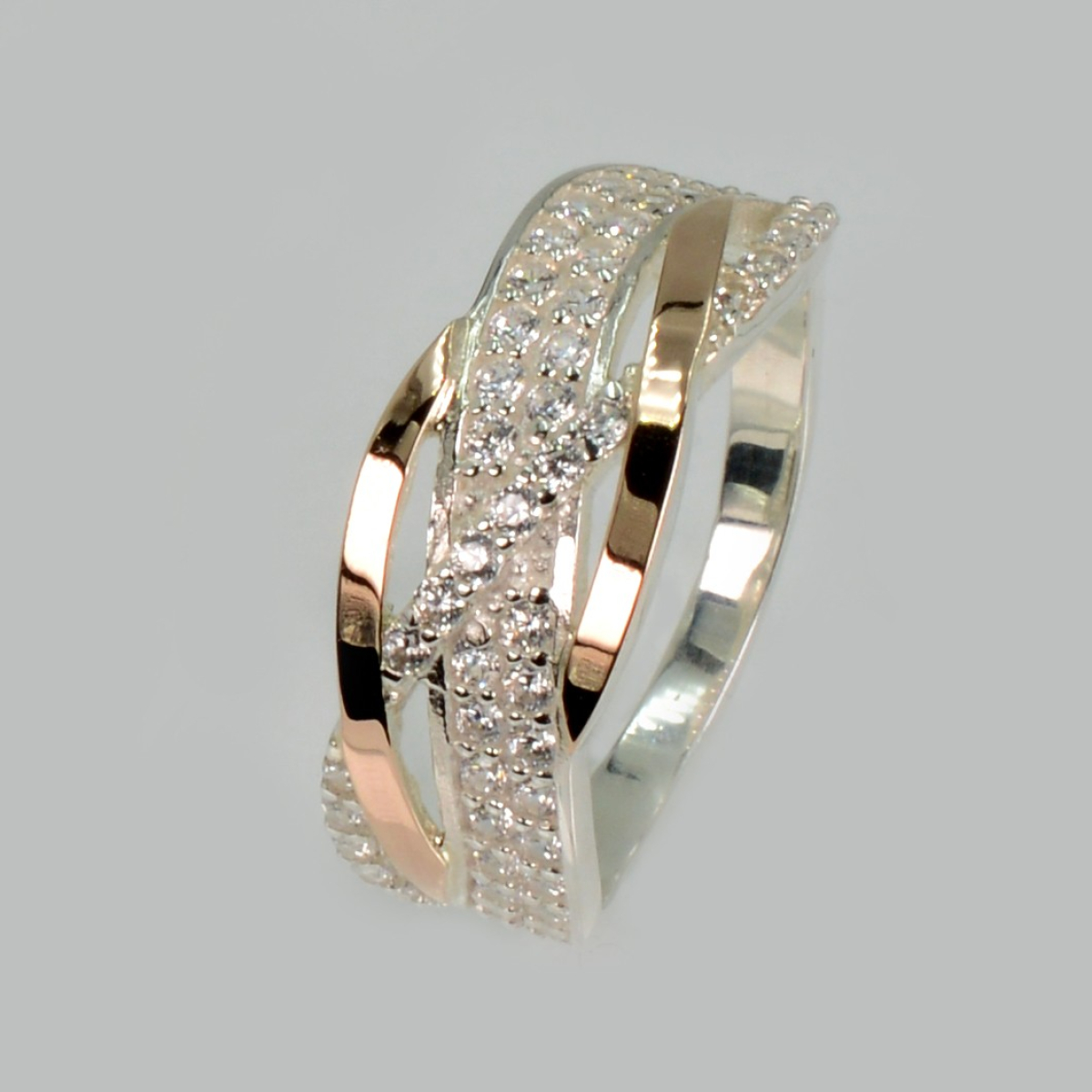 Срібна каблучка з золотими вставками