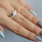 Срібна каблучка з золотими вставками