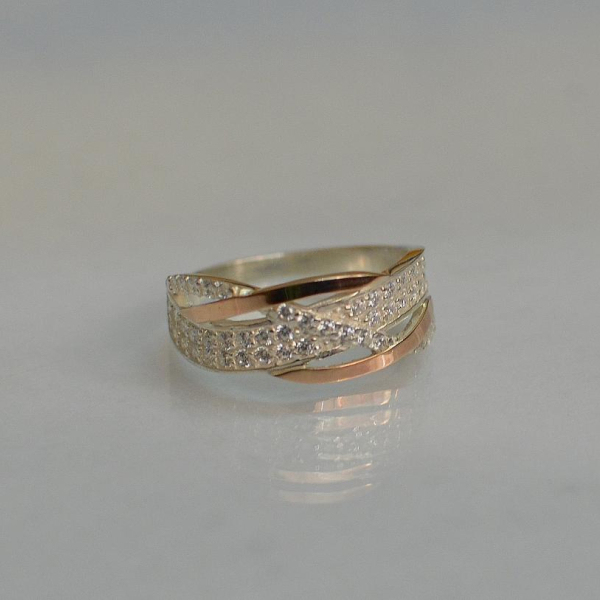 Срібна каблучка з золотими вставками