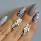 Срібні сережки з золотими вставками