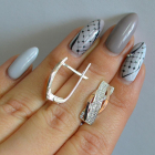 Срібні сережки з золотими вставками