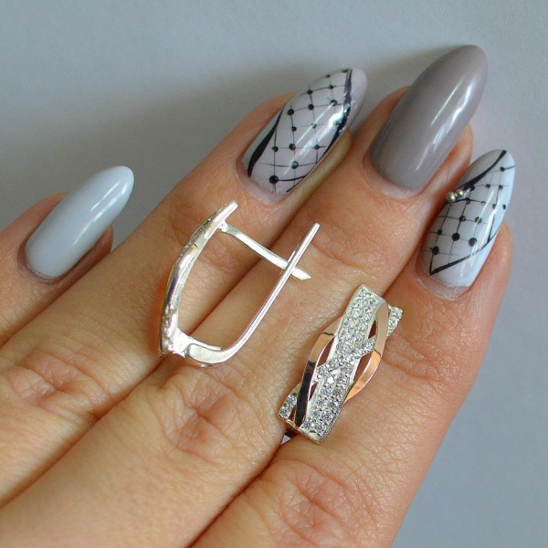 Срібні сережки з золотими вставками