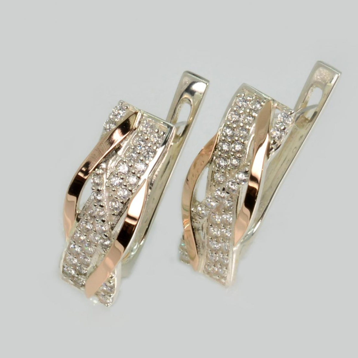 Срібні сережки з золотими вставками