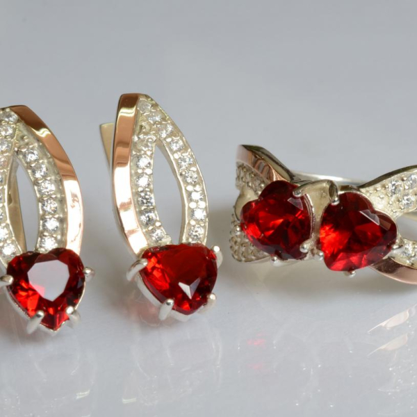 Срібний набір з золотими пластинами