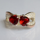 Срібна каблучка з золотими вставками