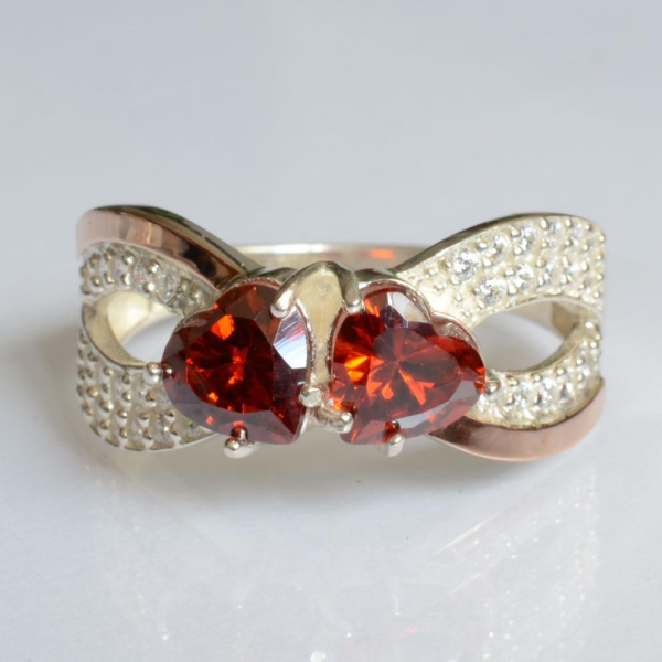 Срібна каблучка з золотими вставками