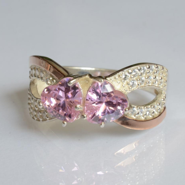 Срібна каблучка з золотими вставками