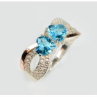 Срібна каблучка з золотими вставками