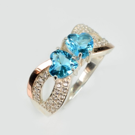 Срібна каблучка з золотими вставками