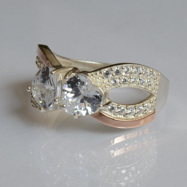 Срібна каблучка з золотими вставками