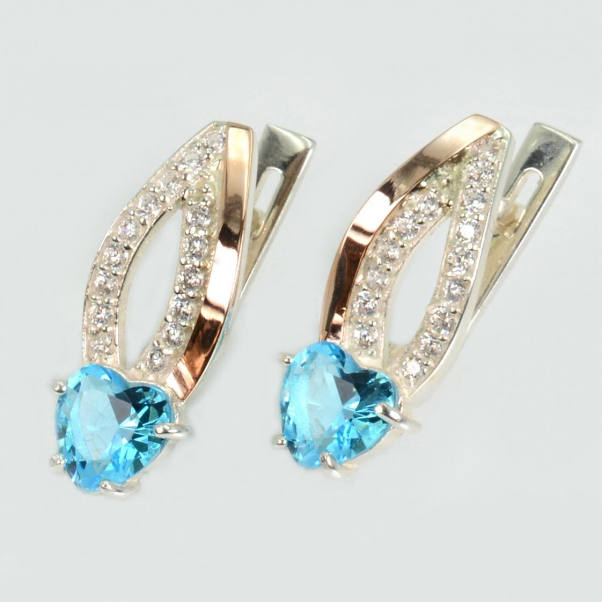 Срібні сережки з золотими пластинами