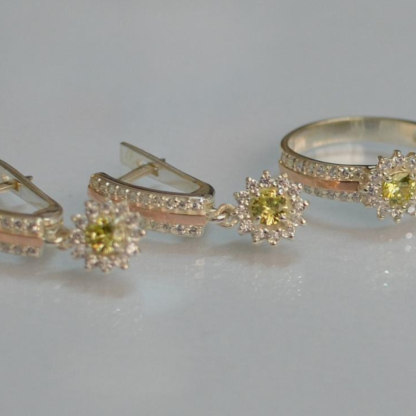 Срібний набір з золотими пластинами