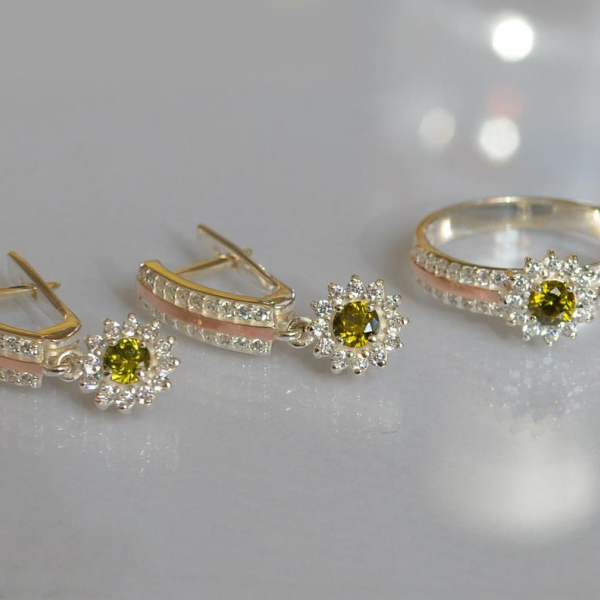 Срібний набір з золотими пластинами